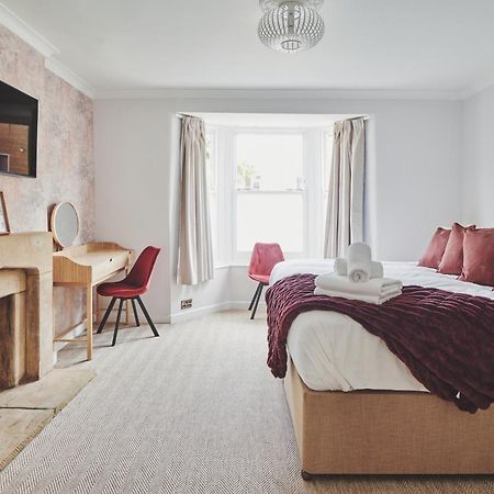 The Lansdowne Guest House Bourton-on-the-Water Eksteriør bilde A bedroom at the hotel