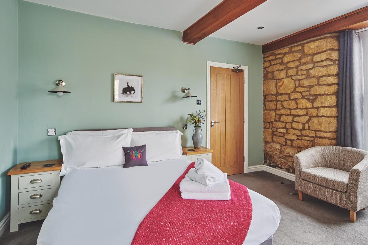 The Lansdowne Guest House Bourton-on-the-Water Eksteriør bilde A bedroom at The Old Post Office