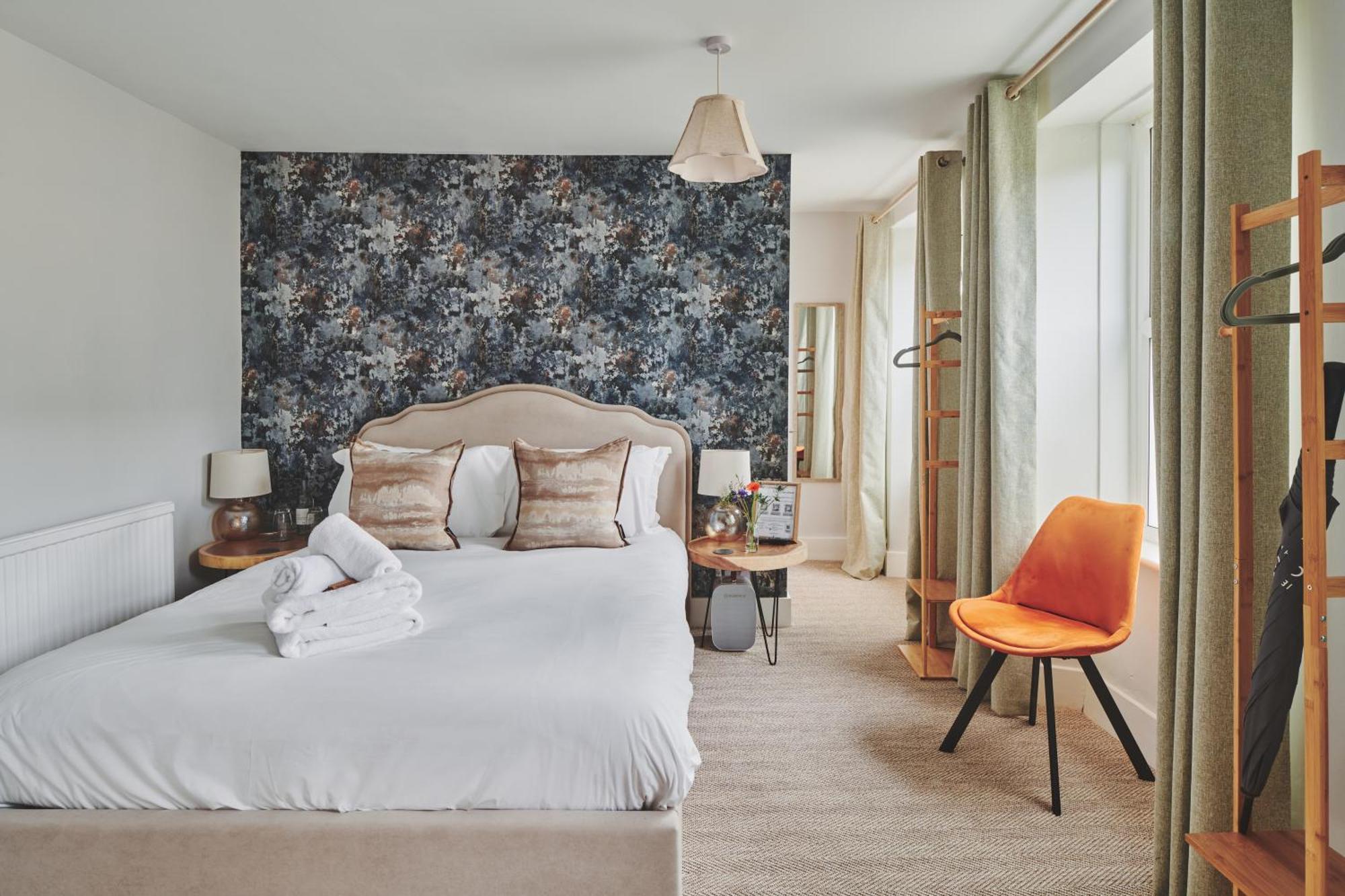 The Lansdowne Guest House Bourton-on-the-Water Eksteriør bilde A bedroom at The Swan